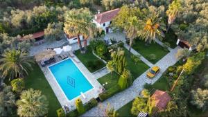 an aerial view of a house with a swimming pool at Villa Olive in Áno Lekhónia
