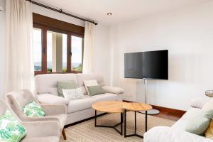 Et tv og/eller underholdning på Genteel Home San Martín + 19 billeder