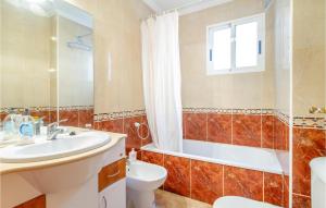 a bathroom with a sink and a toilet and a shower at Amazing Apartment In Torrevieja in Torrevieja