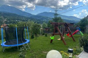 Herní místnost nebo prostor pro děti v ubytování PENSIUNEA HANTIG TURA