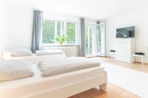 Ένα ή περισσότερα κρεβάτια σε δωμάτιο στο Nice Apartment with balcony in Wetzlar