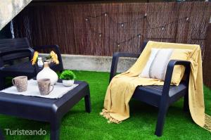Ruang duduk di Dúplex Amaita - parking y piscina comunitaria