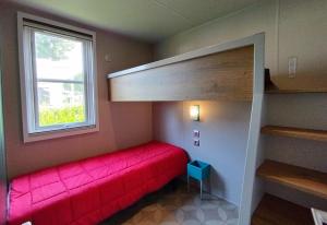 Postel nebo postele na pokoji v ubytování Camping Paradis Le Royon