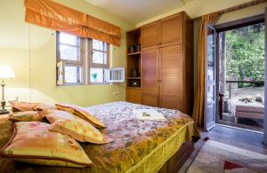 Posteľ alebo postele v izbe v ubytovaní Elia Junior Suite In Epidavros with Shared Pool