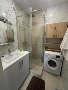 Kúpeľňa v ubytovaní ApartPlus Truskavets - Затишні апартаменти