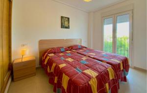 A bed or beds in a room at Amazing Apartment In Sucina With Wifi