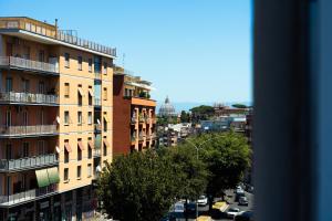 a view of a city from a building at Near Vatican, Irnerio 47 Guest House in Rome