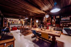 a large room with a bar and some chairs at Ali Baba Infinity in Essaouira