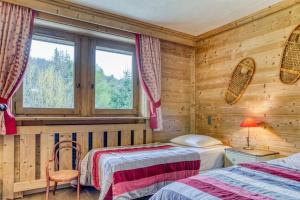 Katil atau katil-katil dalam bilik di Magnifique chalet Megève avec piscine et sauna +47 gambar