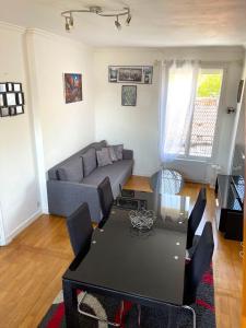 Χώρος καθιστικού στο Appartement en duplex entre Paris et Versailles +3 φωτογραφίες