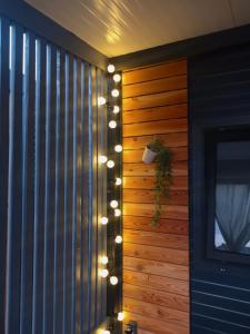 a room with a wall with lights on it at Mobile Home L&L in Drage