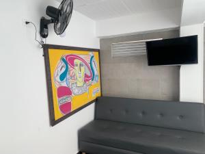 Et tv og/eller underholdning på Hotel Lindbergh Quindio + 23 billeder