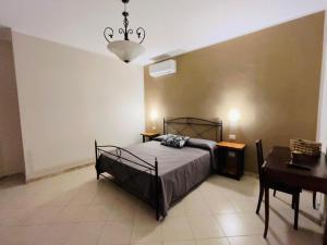 Postel nebo postele na pokoji v ubytování B&B Tempa Rossa