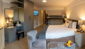 Gulta vai gultas numurā naktsmītnē Delphi Resort Hotel & Spa