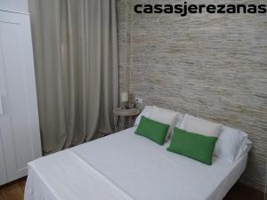 Postel nebo postele na pokoji v ubytování Casas jerezanas Loft Olivier