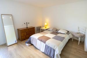 Katil atau katil-katil dalam bilik di Appartement dans maison Urcuit +14 gambar