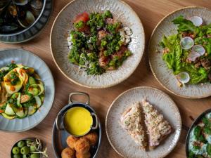 a group of plates of food on a table at The Nici in Bournemouth