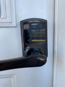a close up of a door with a toaster oven at Maison d edouard in Saint-Antonin