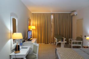 Posezení v ubytování L'Amitié Hôtel N'Djamena
