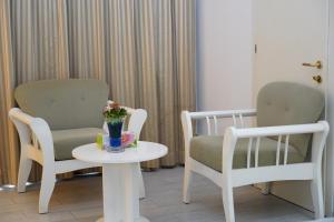 Posezení v ubytování L'Amitié Hôtel N'Djamena