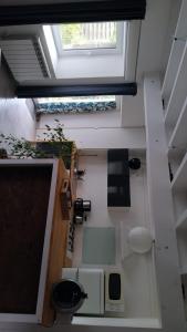 an overhead view of a kitchen with a skylight at Maison à la campagne in Les Brouzils