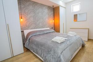 Postel nebo postele na pokoji v ubytování Villa Teresa Relax