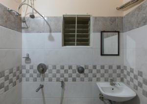 Koupelna v ubytování Prasana Residency