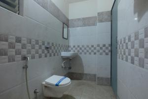 Koupelna v ubytování Prasana Residency