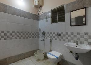 Koupelna v ubytování Prasana Residency