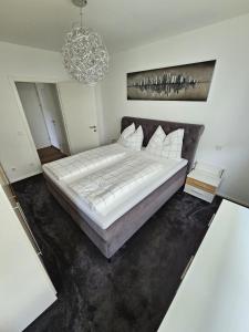 Posteľ alebo postele v izbe v ubytovaní Ferienwohnung