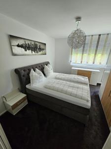 Posteľ alebo postele v izbe v ubytovaní Ferienwohnung