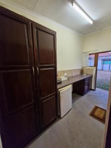 Η κουζίνα ή μικρή κουζίνα στο Vegkop Gaste Huis - B&B