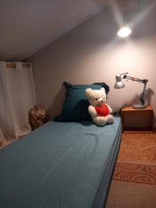 Letto o letti in una camera di Chambre d'hote la passerelle