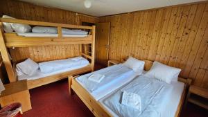 Postel nebo postele na pokoji v ubytování Berggasthaus-Strassberg
