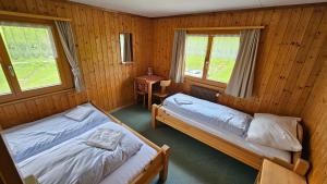 Postel nebo postele na pokoji v ubytování Berggasthaus-Strassberg