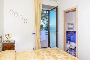 Postel nebo postele na pokoji v ubytování Villa Borgo San Michele