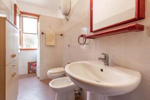 Koupelna v ubytování Villa Caletta Feraxi-Muravera 3 minuti dal mare + 34 fotografií