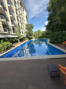 Bazén v ubytování 7N-D Cozy Resort Tambuli Seaside Living nebo v jeho okolí