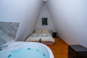 Postel nebo postele na pokoji v ubytování Arditi's Chalets