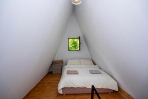 Postel nebo postele na pokoji v ubytování Arditi's Chalets