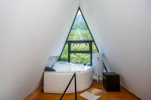 Postel nebo postele na pokoji v ubytování Arditi's Chalets