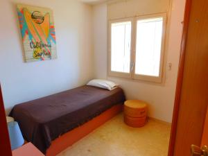 Postel nebo postele na pokoji v ubytování GMID IMMO Apartamento Castell Joncar 3