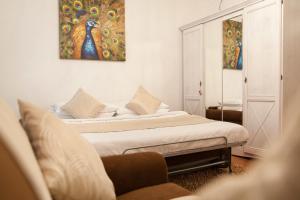 Ένα ή περισσότερα κρεβάτια σε δωμάτιο στο Apartments Artorius Laško