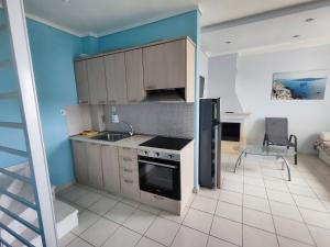 Kuchyň nebo kuchyňský kout v ubytování First line house