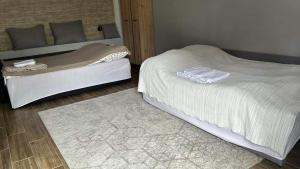 Ένα ή περισσότερα κρεβάτια σε δωμάτιο στο Benny & Bella Guest House