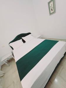 Letto o letti in una camera di Karray Home Appartement Salon 2 RDC avec Jardin