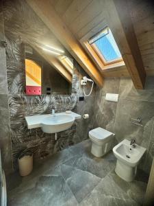 Koupelna v ubytování Pasitea B&B + 30 fotografií