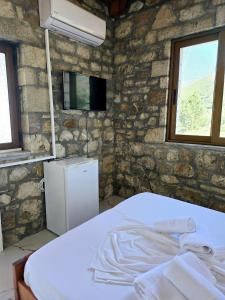 Postel nebo postele na pokoji v ubytování Ambelas Guest Rooms 6