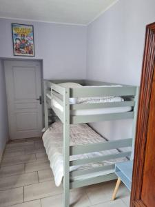 Posteľ alebo postele v izbe v ubytovaní LES CRISTELLES