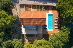an overhead view of a building with a swimming pool at Modern Villa Krk in Gabonjin +7 photos
